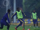 In a rainy weather, the team continue their training. 